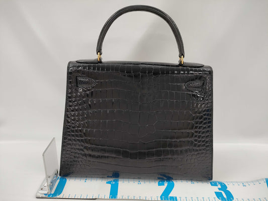HERMES Kelly 28 Black Handbag with Gold Hardware and G Stamp