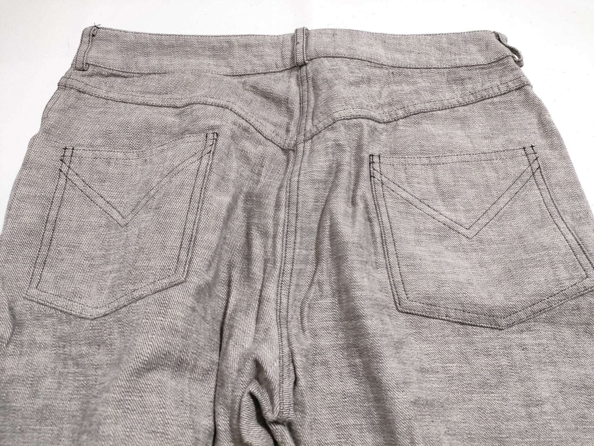 Christian Dior Galliano-era denim pants with D logo hardware