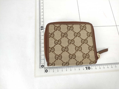 GUCCI GG Canvas Bifold Wallet with Round Zip