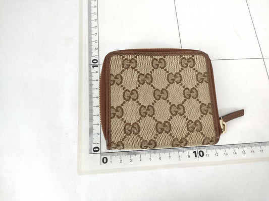 GUCCI GG Canvas Bifold Wallet with Round Zip