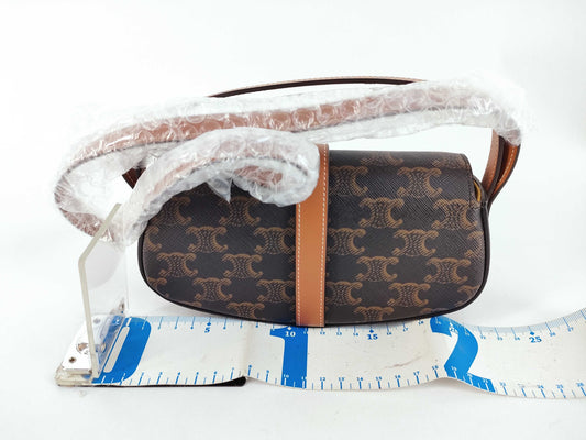 CELINE Triomphe Clutch Taboo PVC and Leather Shoulder Bag Brown