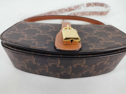 CELINE Triomphe Clutch Taboo PVC and Leather Shoulder Bag Brown