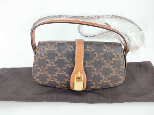CELINE Triomphe Clutch Taboo PVC and Leather Shoulder Bag Brown