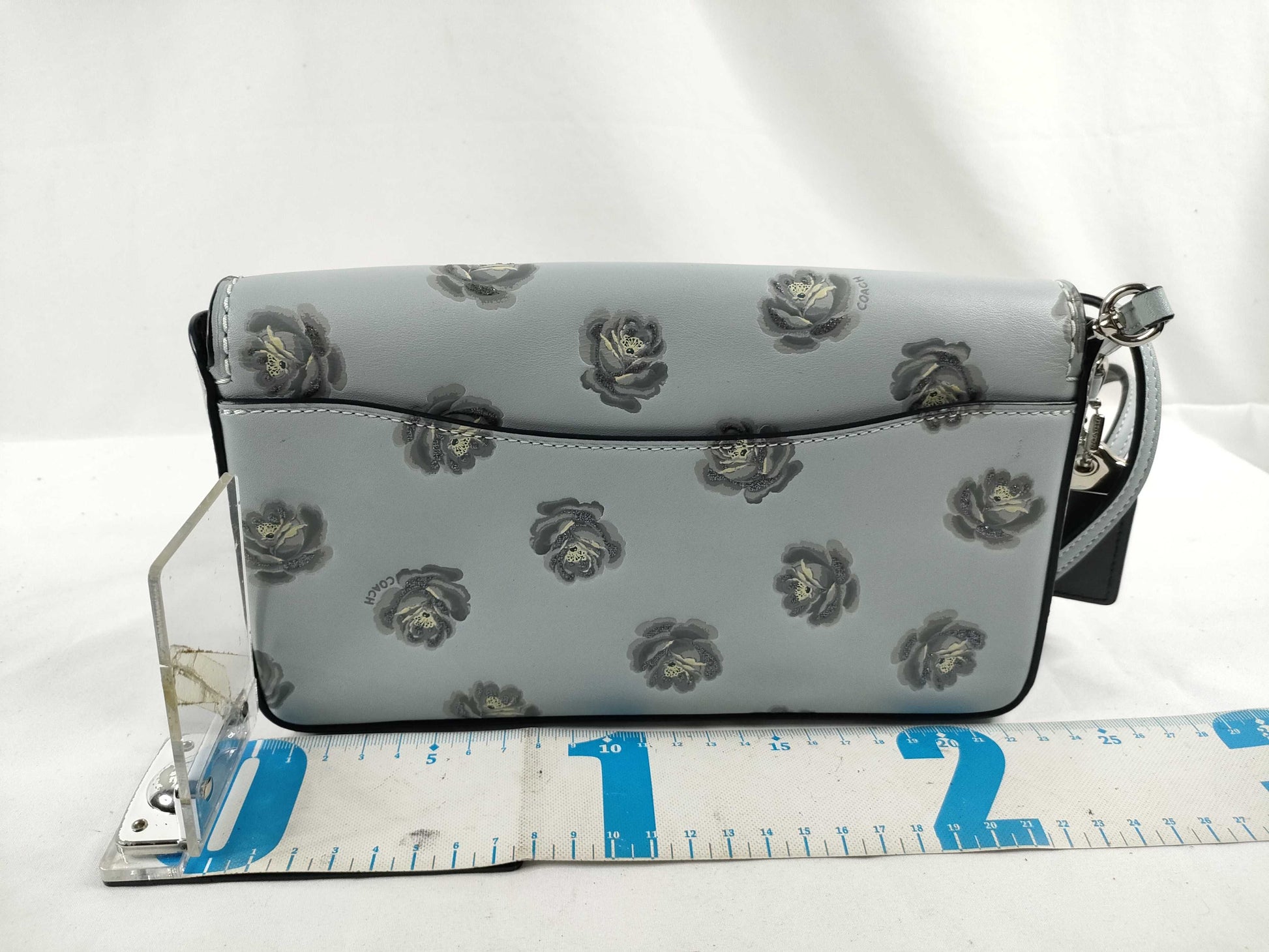 COACH shoulder bag in light blue calf leather with floral print