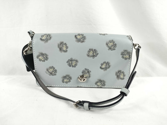 COACH shoulder bag in light blue calf leather with floral print