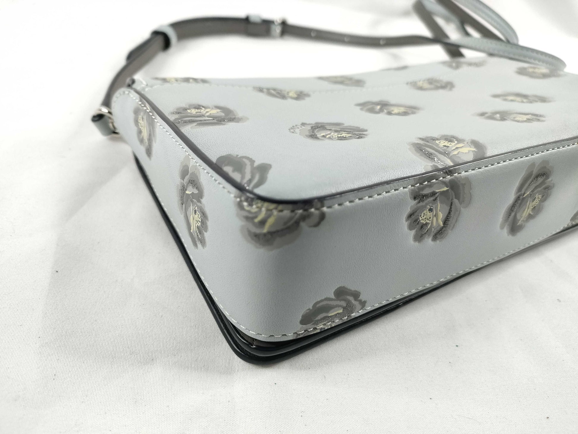 COACH shoulder bag in light blue calf leather with floral print