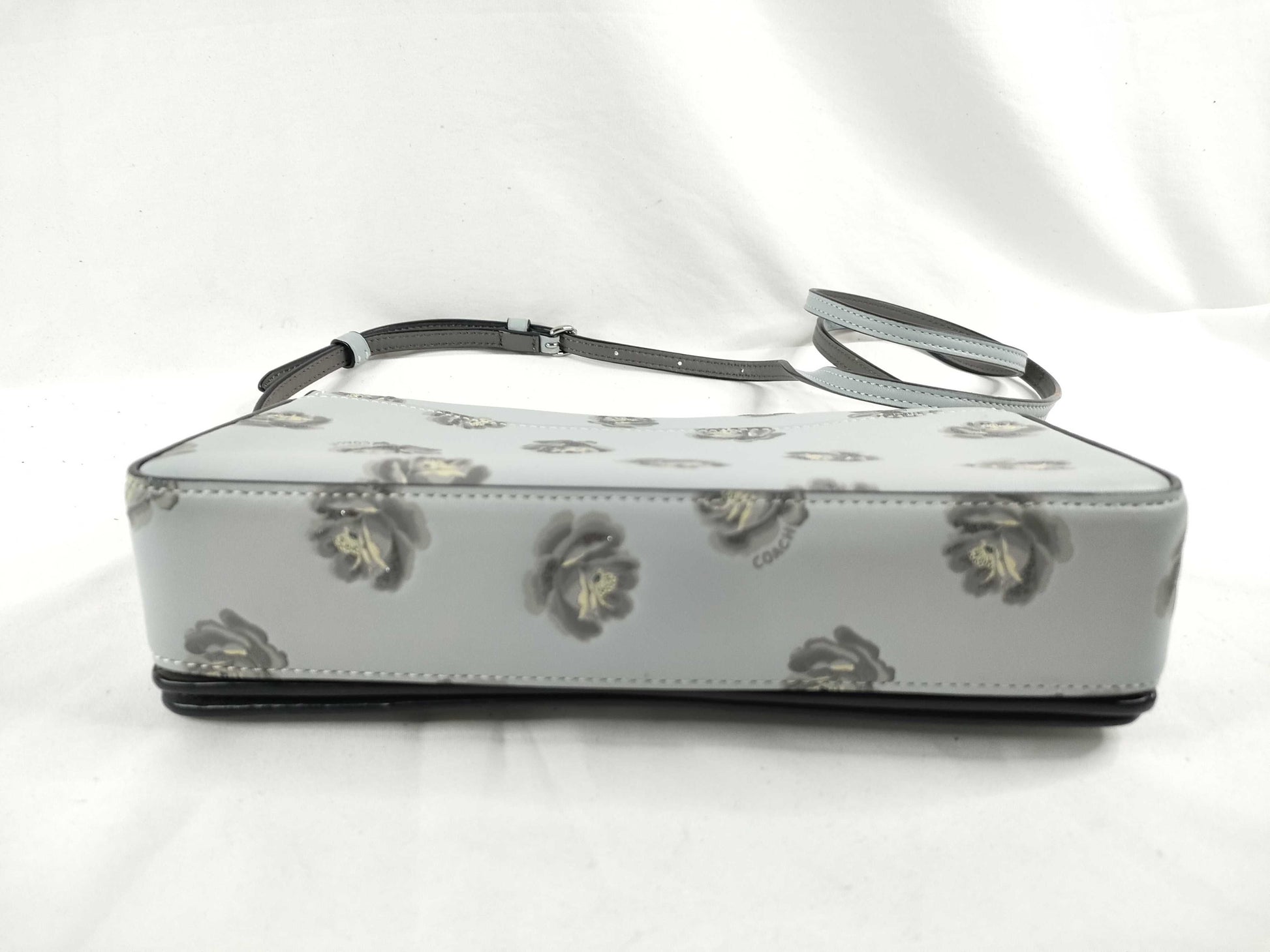 COACH shoulder bag in light blue calf leather with floral print