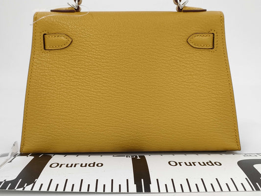 HERMES Mini Kelly Do Handbag, Chevre Jaune Ambre, Stitched, Silver Hardware, W Stamp, Hardware Seal