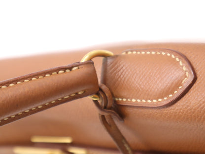 HERMES Kelly 32 Handbag with GD hardware, dust bag, padlock, clasp, and two keys.