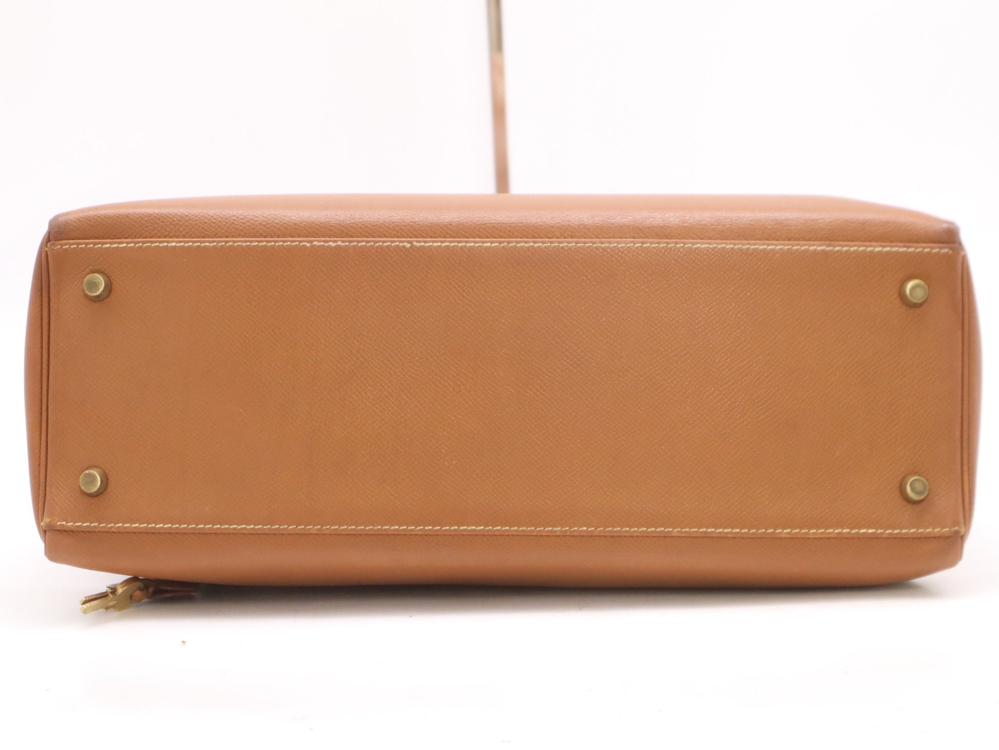 HERMES Kelly 32 Handbag with GD hardware, dust bag, padlock, clasp, and two keys.