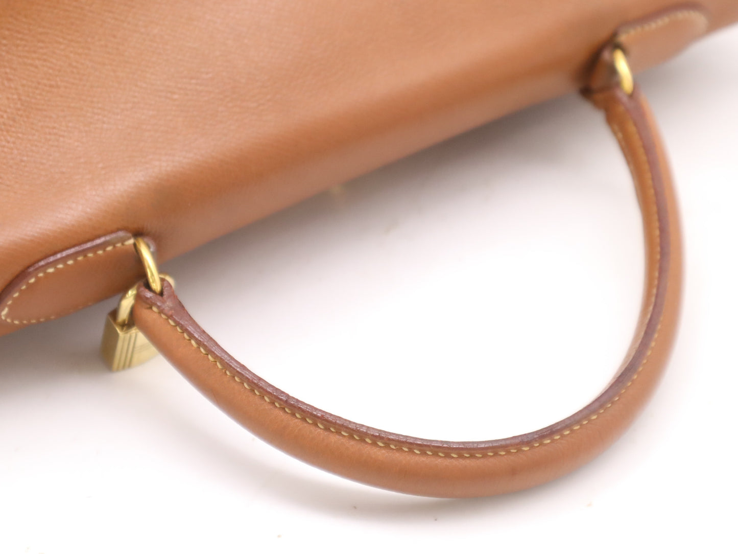 HERMES Kelly 32 Handbag with GD hardware, dust bag, padlock, clasp, and two keys.