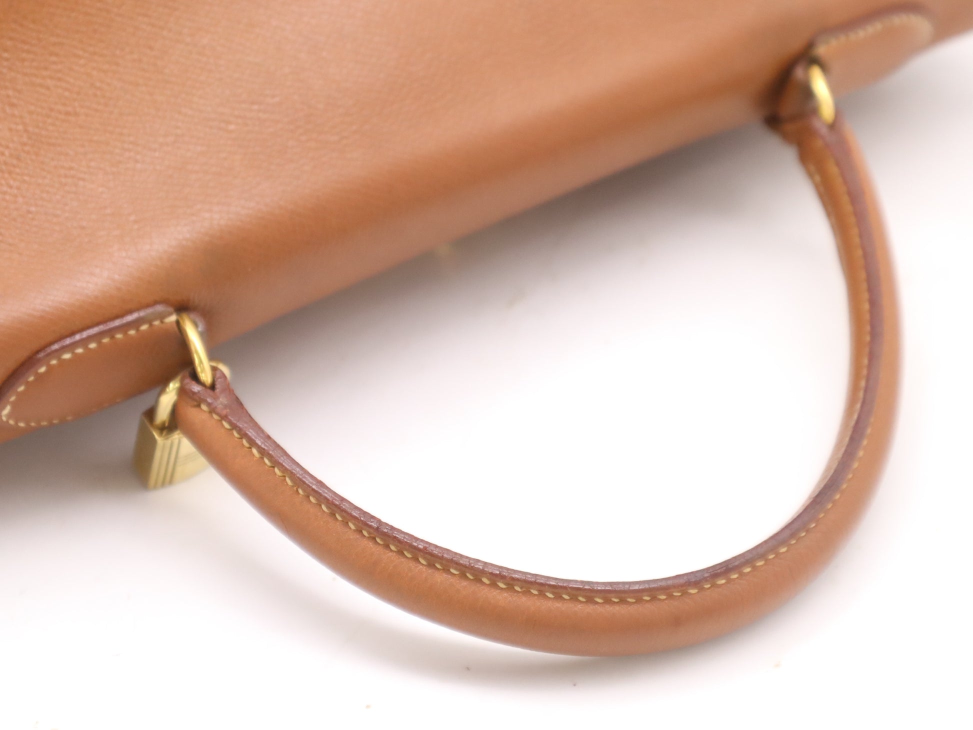 HERMES Kelly 32 Handbag with GD hardware, dust bag, padlock, clasp, and two keys.