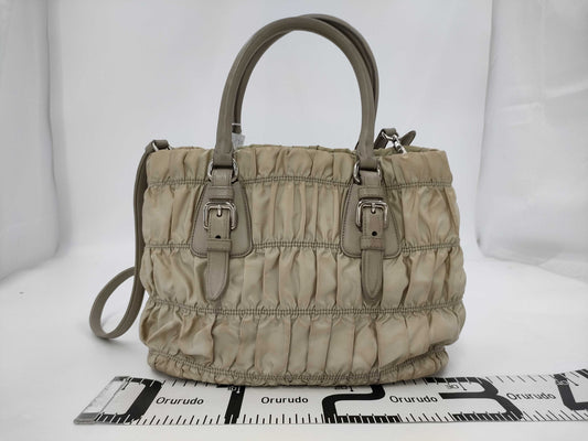 PRADA Triangle Logo Gathered Handbag
