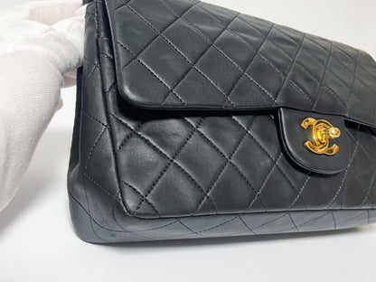CHANEL Double Flap Matelasse Black Lambskin Shoulder Bag with Seal