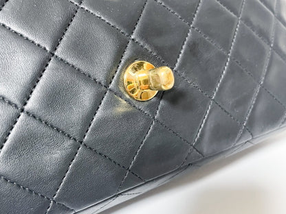 CHANEL Double Flap Matelasse Black Lambskin Shoulder Bag with Seal