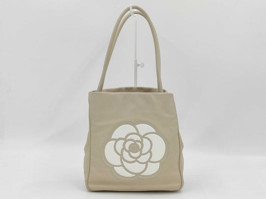 CHANEL Camellia Lambskin Tote Bag in White with CHANEL Logo Sticker