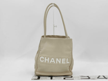 CHANEL Camellia Lambskin Tote Bag in White with CHANEL Logo Sticker