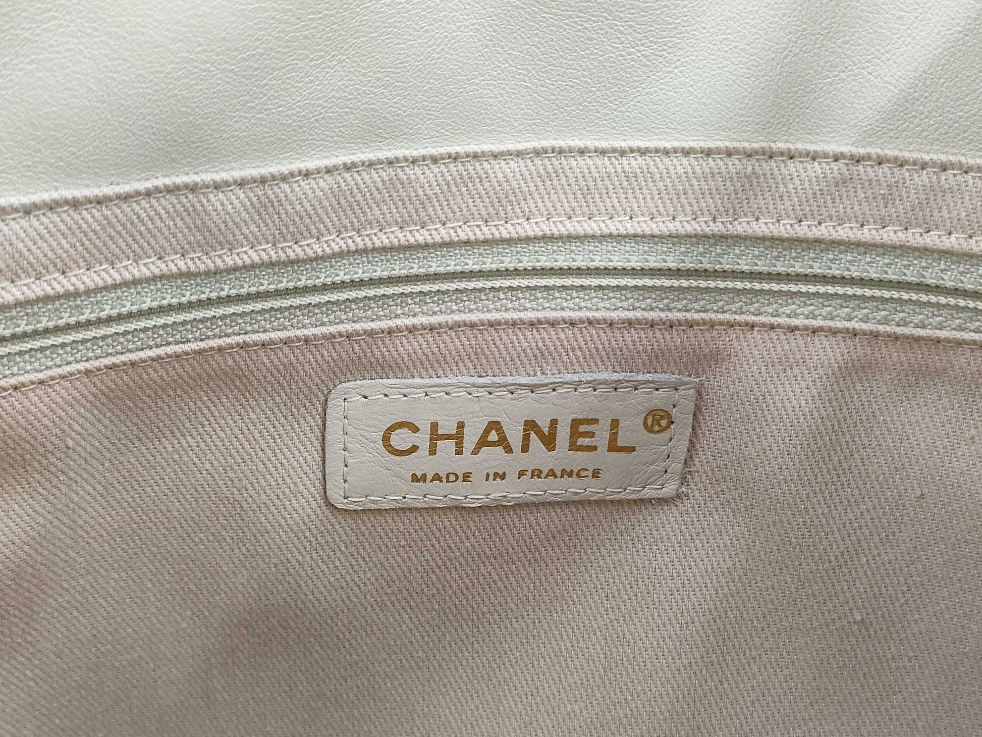 CHANEL Camellia Lambskin Tote Bag in White with CHANEL Logo Sticker