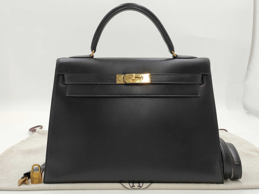 HERMES Kelly 32 Box Calf Leather Black with Storage Bag, Cadena Cloche, and Key, Small Handbag