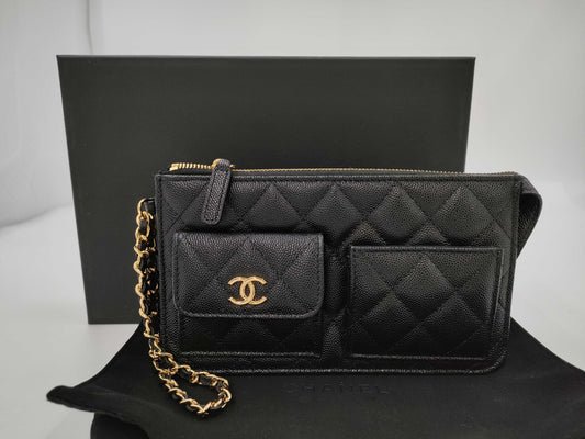 CHANEL CHANEL Multi-Pocket Clutch Bag in Black Caviar Skin with Seal
