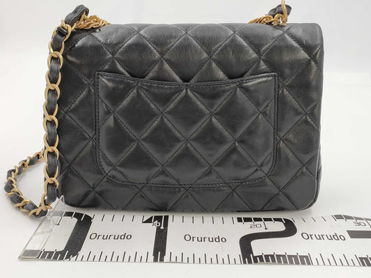 CHANEL Matelasse Chain Shoulder Bag in Black Lamb