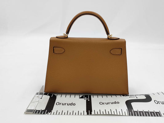 HERMES Brand New, Unused Hermès Mini Kelly 2 Verso Chevre Mysore Shoulder Bag with Gold Hardware, Size 28, Camel/4H Cocoa, Double Stamp