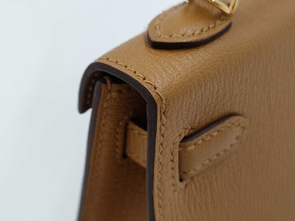 HERMES Brand New, Unused Hermès Mini Kelly 2 Verso Chevre Mysore Shoulder Bag with Gold Hardware, Size 28, Camel/4H Cocoa, Double Stamp