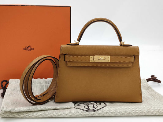 HERMES Brand New, Unused Hermès Mini Kelly 2 Verso Chevre Mysore Shoulder Bag with Gold Hardware, Size 28, Camel/4H Cocoa, Double Stamp