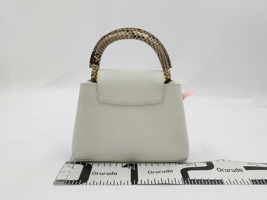 LOUIS VUITTON Louis Vuitton Logo Capucines Mini White Python RFID Handbag
