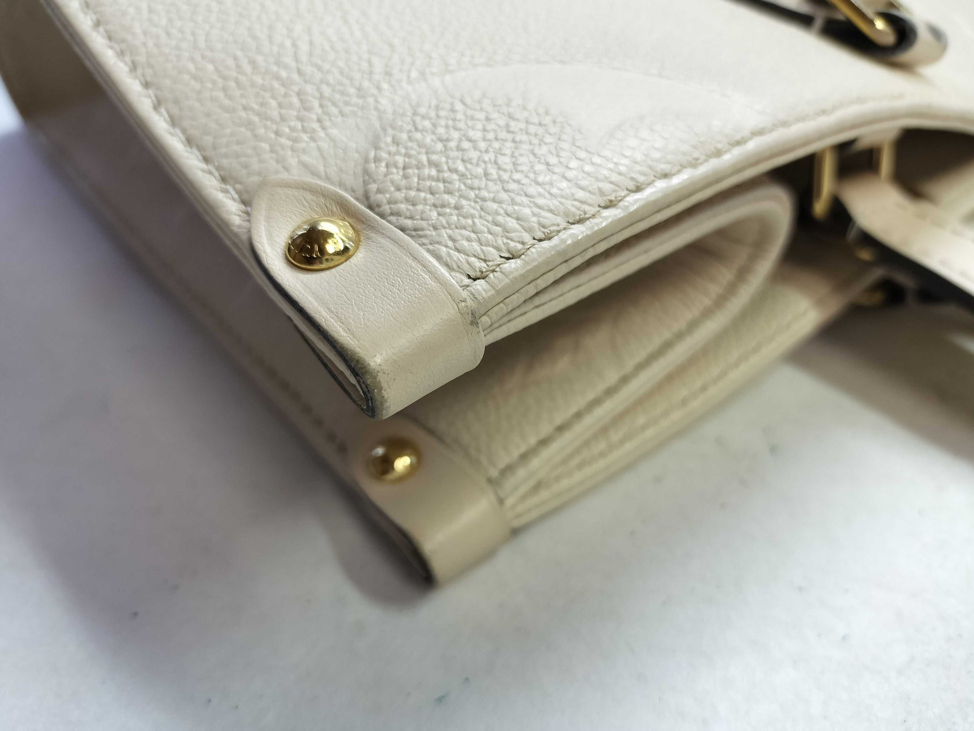 LOUIS VUITTON Monogram Empreinte Louis Vuitton On the Go MM Tote Bag