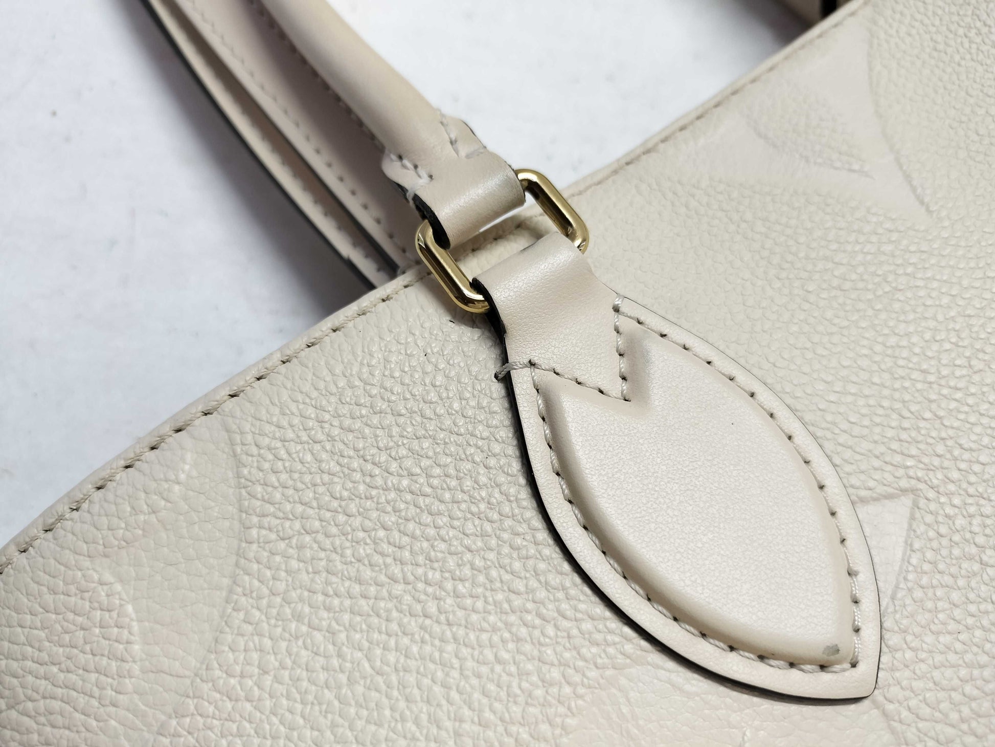 LOUIS VUITTON Monogram Empreinte Louis Vuitton On the Go MM Tote Bag
