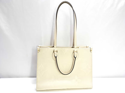 LOUIS VUITTON Monogram Empreinte Louis Vuitton On the Go MM Tote Bag