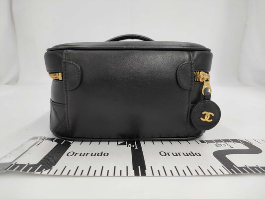 CHANEL Bicolor Coco Mark Lambskin Leather Vanity Bag in Black with Gold Hardware