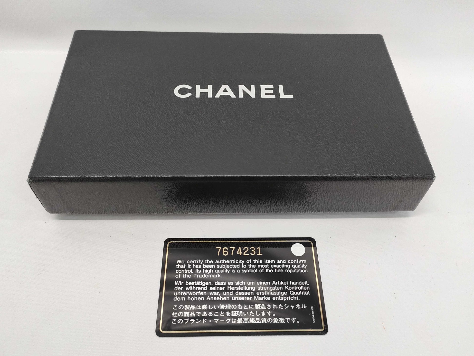 CHANEL Caviar Leather Bi-fold Wallet with Hook and Snap Closure, Black