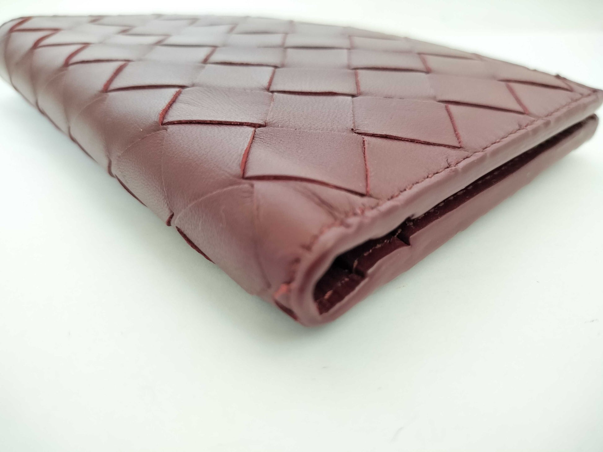 BOTTEGA VENETA 749940VCPP22247 Bi-fold Wallet, Barolo Bordeaux Leather, Gold, 2025 Current Model