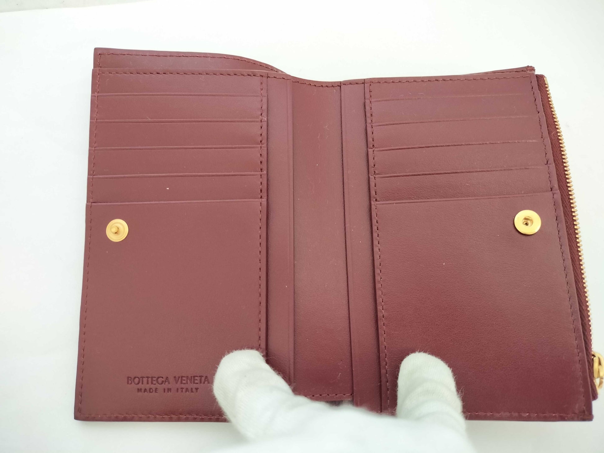 BOTTEGA VENETA 749940VCPP22247 Bi-fold Wallet, Barolo Bordeaux Leather, Gold, 2025 Current Model