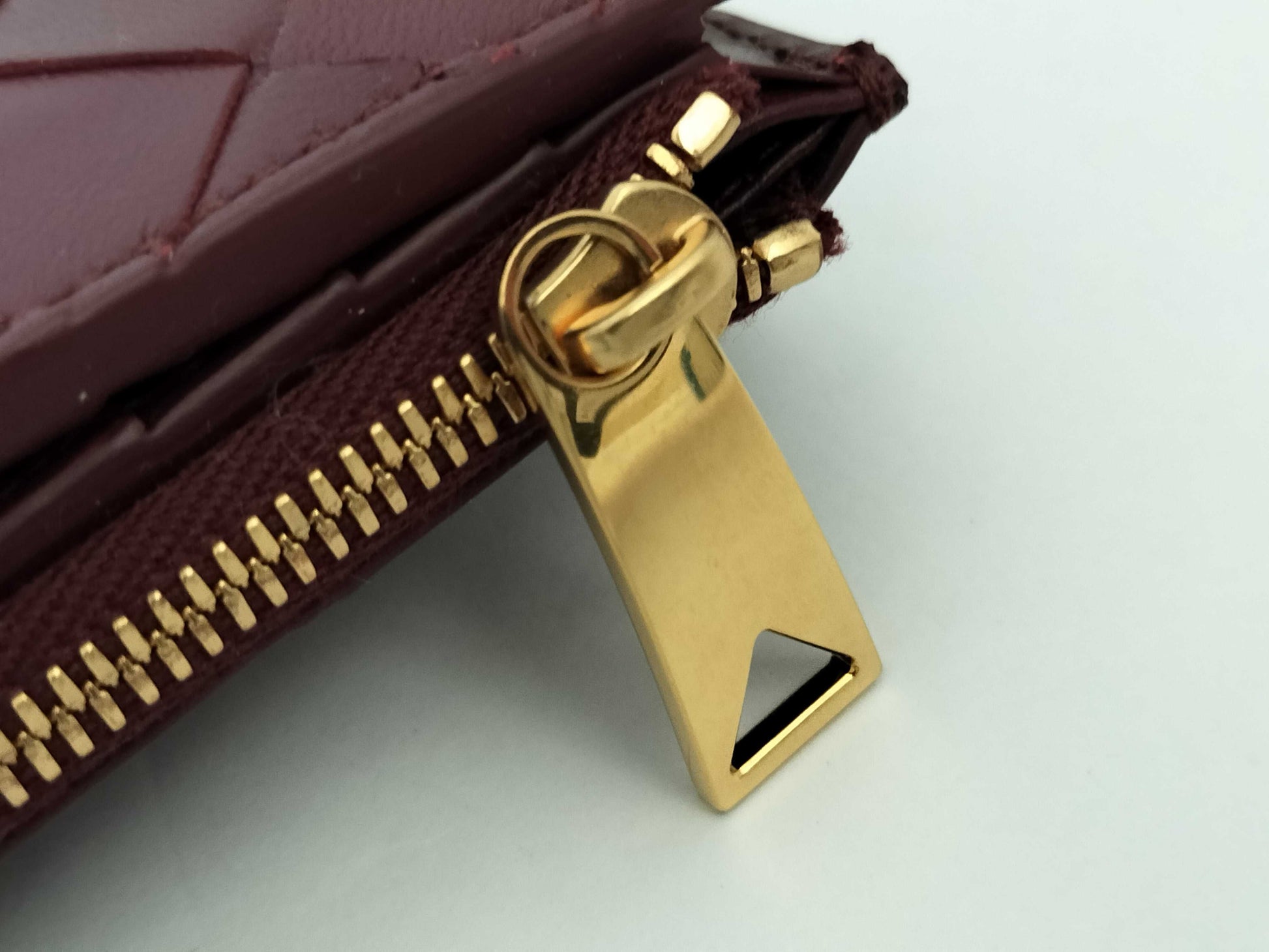 BOTTEGA VENETA 749940VCPP22247 Bi-fold Wallet, Barolo Bordeaux Leather, Gold, 2025 Current Model