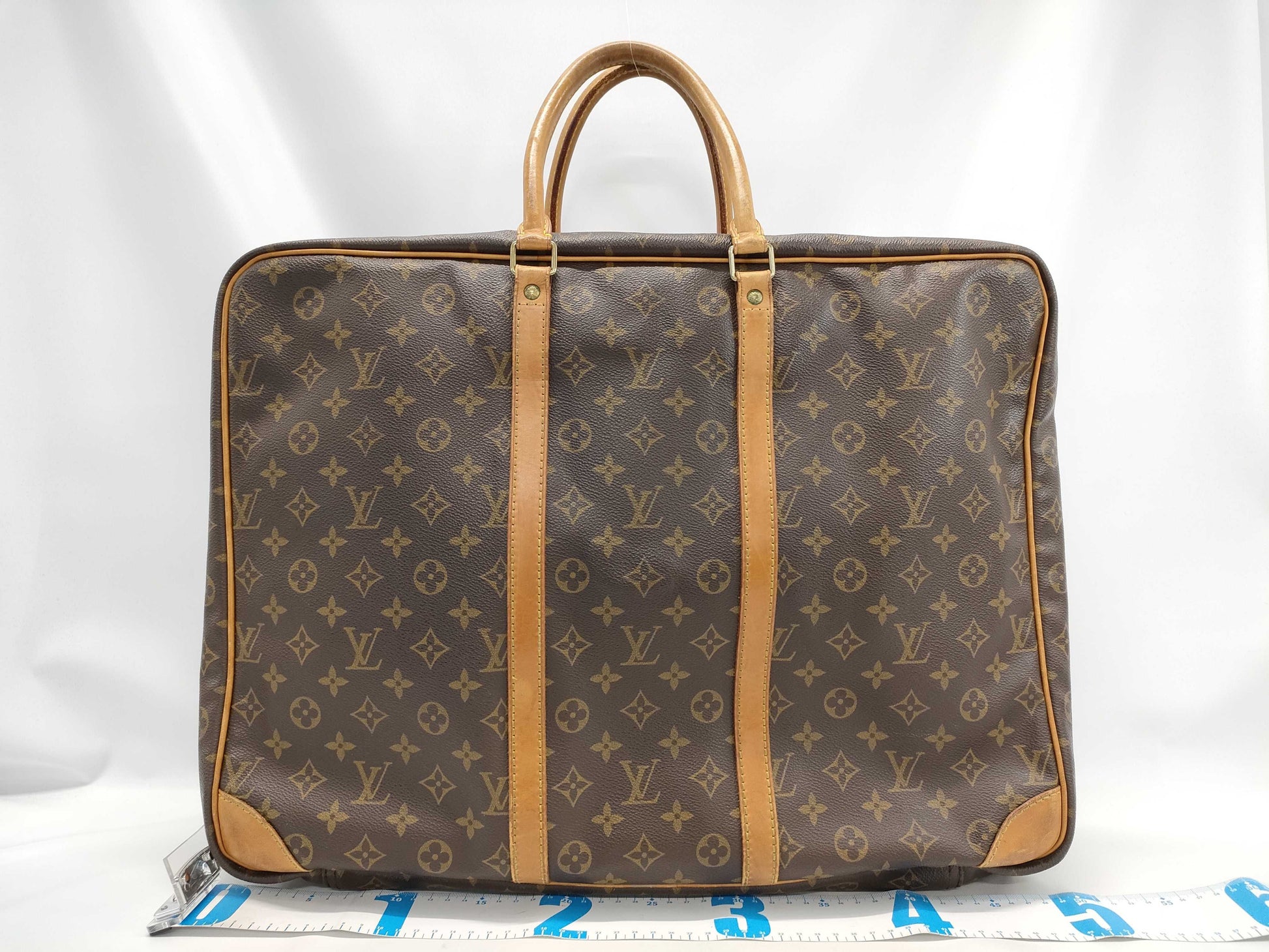 LOUIS VUITTON Monogram Sirius 55 Handbag