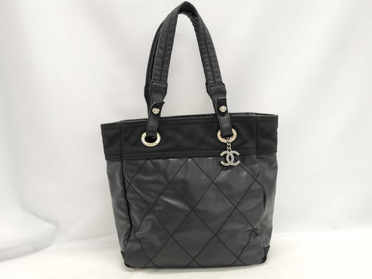 CHANEL Paris Biarritz Tote PM Coated Canvas Black with Silver Hardware A34208 Tote Bag