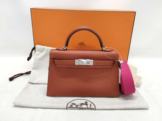 HERMES Kelly Mini II Cuivre Shoulder Bag with P hardware, Chevre U stamp, and protective seal