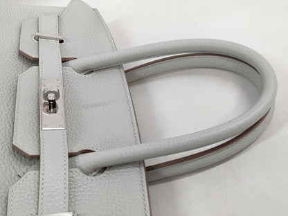 HERMES Birkin 30 handbag in ivory with silver hardware and a C stamp.