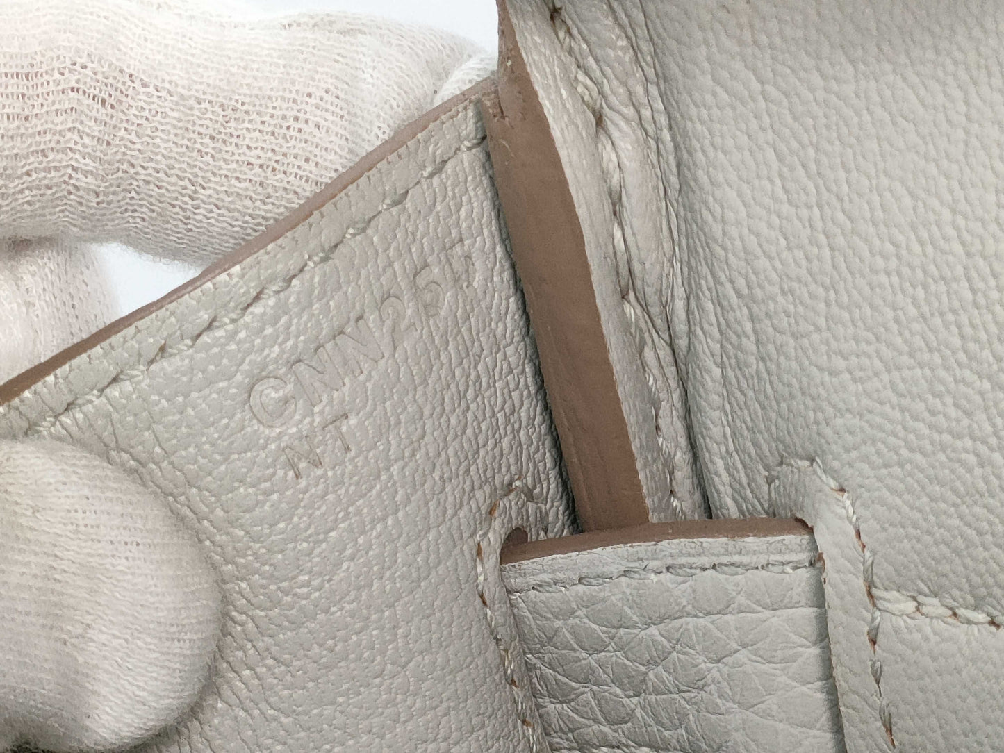 HERMES Birkin 30 handbag in ivory with silver hardware and a C stamp.