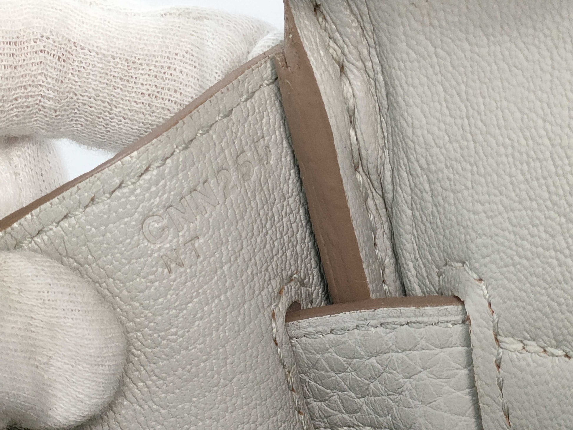 HERMES Birkin 30 handbag in ivory with silver hardware and a C stamp.