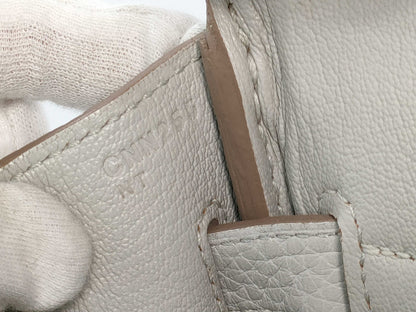 HERMES Birkin 30 handbag in ivory with silver hardware and a C stamp.