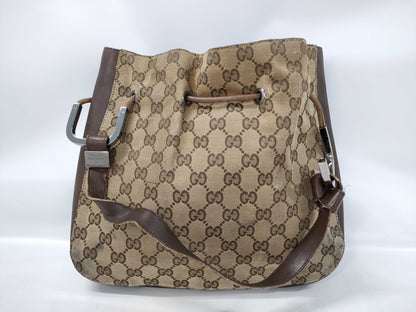 GUCCI One-Shoulder GG Canvas Drawcord Shoulder Bag