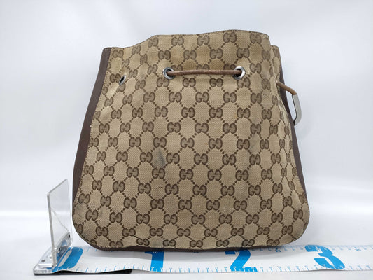 GUCCI One-Shoulder GG Canvas Drawcord Shoulder Bag
