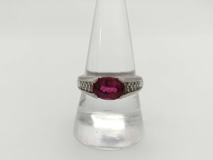 2.22ct colored stone, 0.23ct diameter, PT900, 8.9g ring 