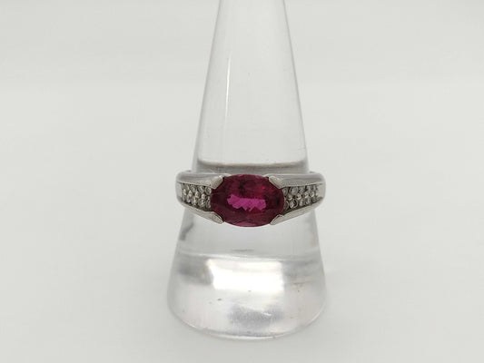 2.22ct colored stone, 0.23ct diameter, PT900, 8.9g ring 