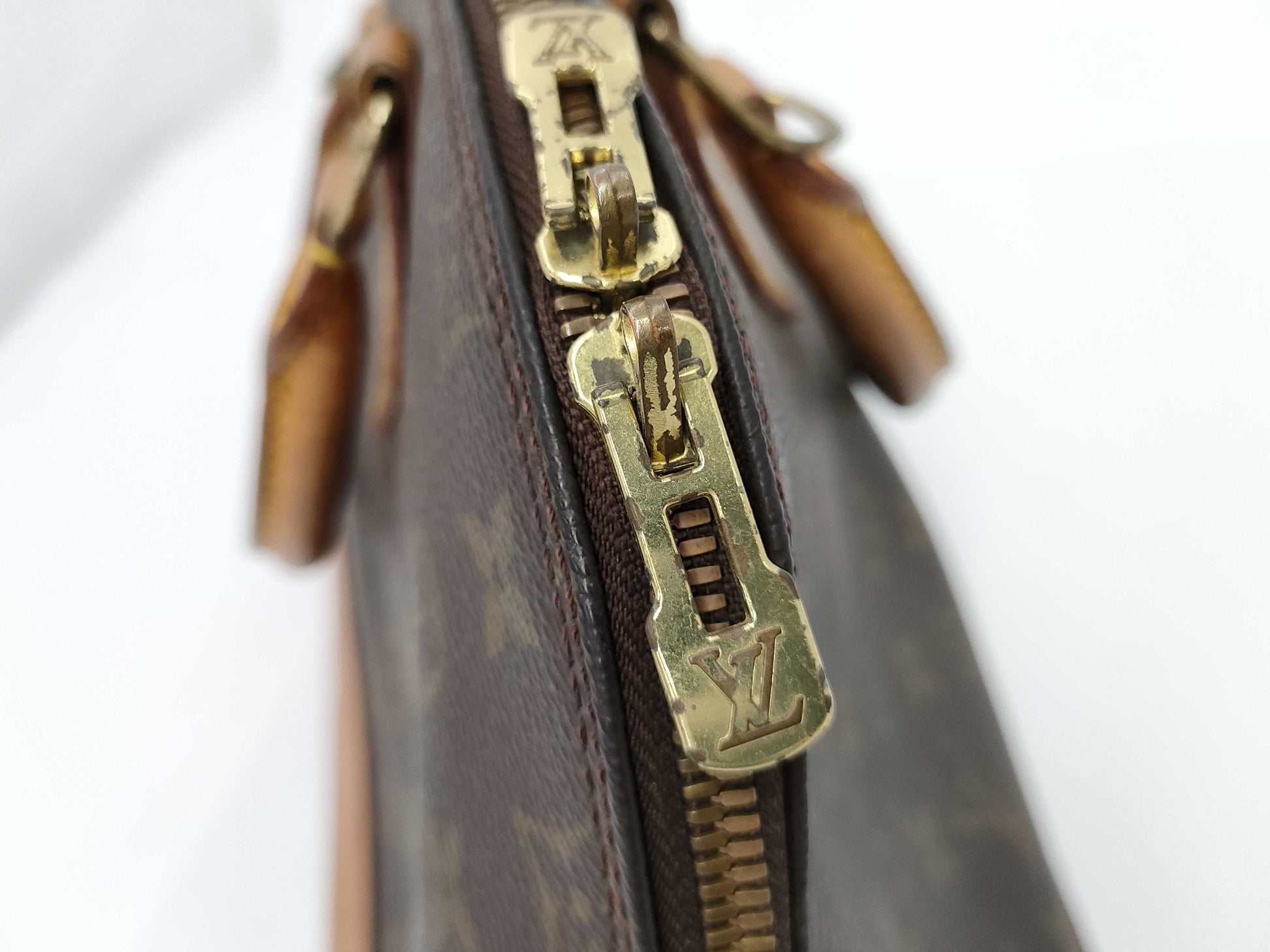 LOUIS VUITTON Monogram Alma Handbag