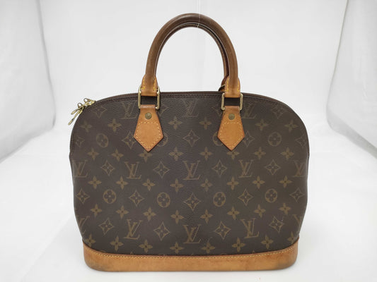 LOUIS VUITTON Monogram Alma Handbag